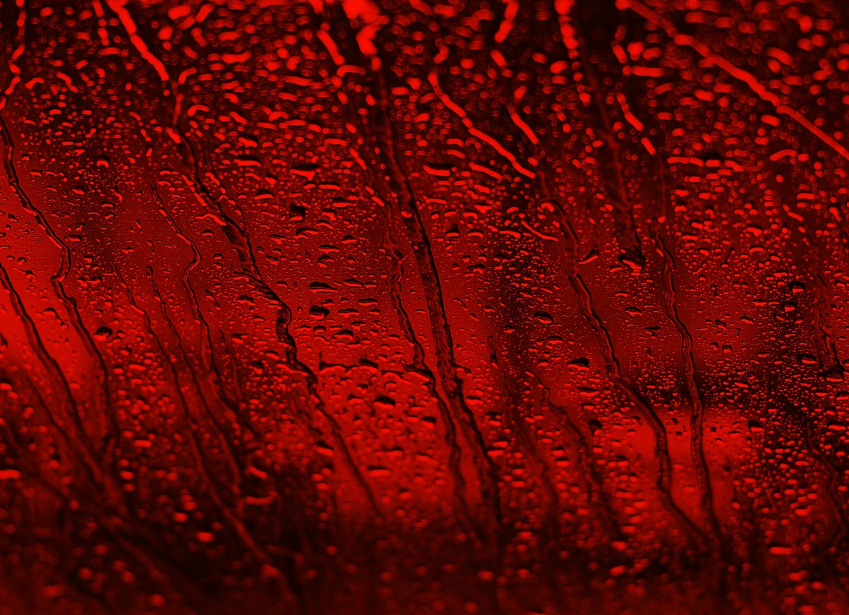 red rain on a window